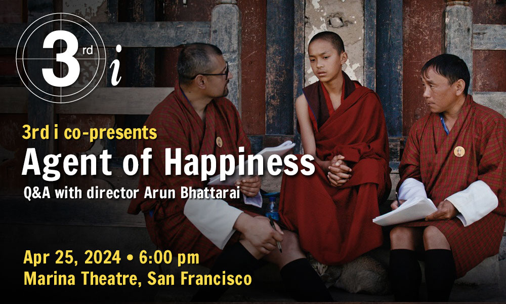 Photo of two Bhutanese government officials discussing the question of happiness with an adolescent boy wearing dark red robes, in front of what may be a Buddhist temple. The text atop the image reads: 3rd i co-presents Agent of Happiness Q&A with director Arun Bhattarai Apr 25, 2024 ˑ 6:00 pm Marina Theatre, San Francisco